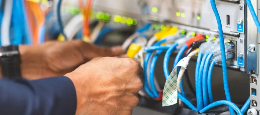 Professional network cabling and wiring setup representing network solutions services in Pakistan